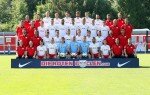 LEIPZIG,GERMANY,19.JUL.14 - SOCCER - 2. DFL, 2. Deutsche Bundesliga, RasenBallsport Leipzig, team photo shooting. Image shows the team of RB Leipzig with physical therapist Anja Strobel, equipment manager Peter Hergert, Dominik Kaiser, Diego Demme, Benjam
